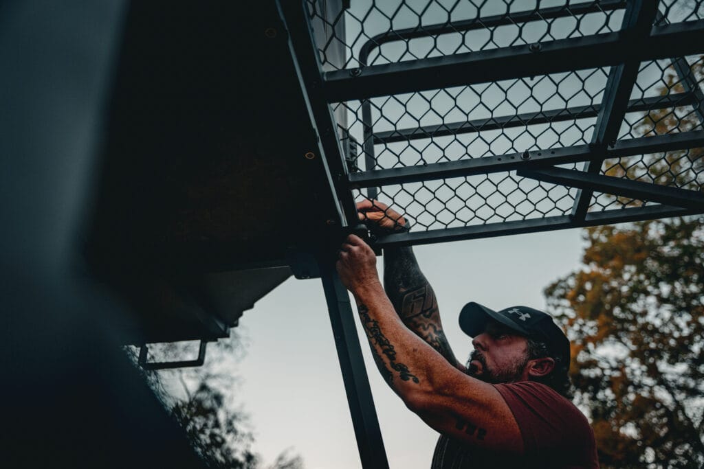 setting up the exterior platform of an elevated hunting blind