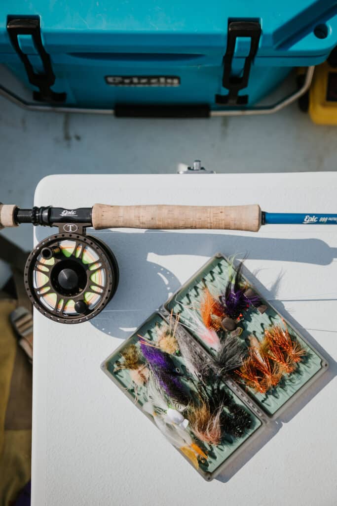 fly fishing rod, reel and flies in fly box
