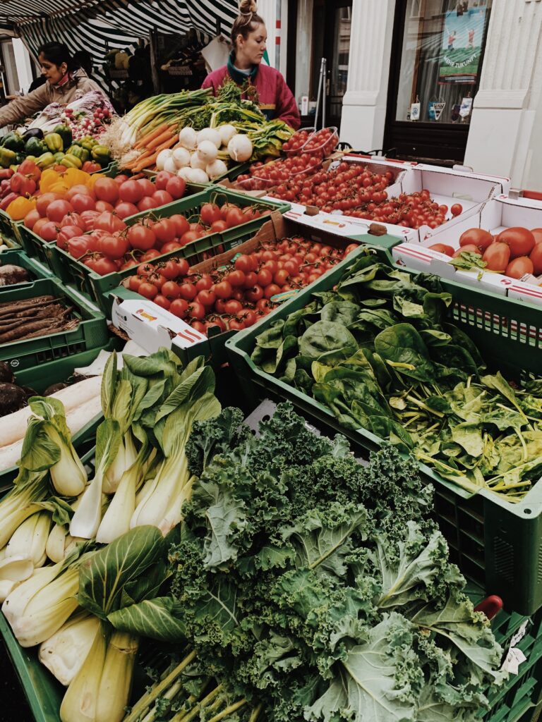 fresh produce on display at a farmers market
