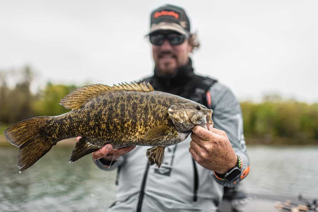 matt peters holding a 5 pound smallmouth bass caught on mille lacs lake